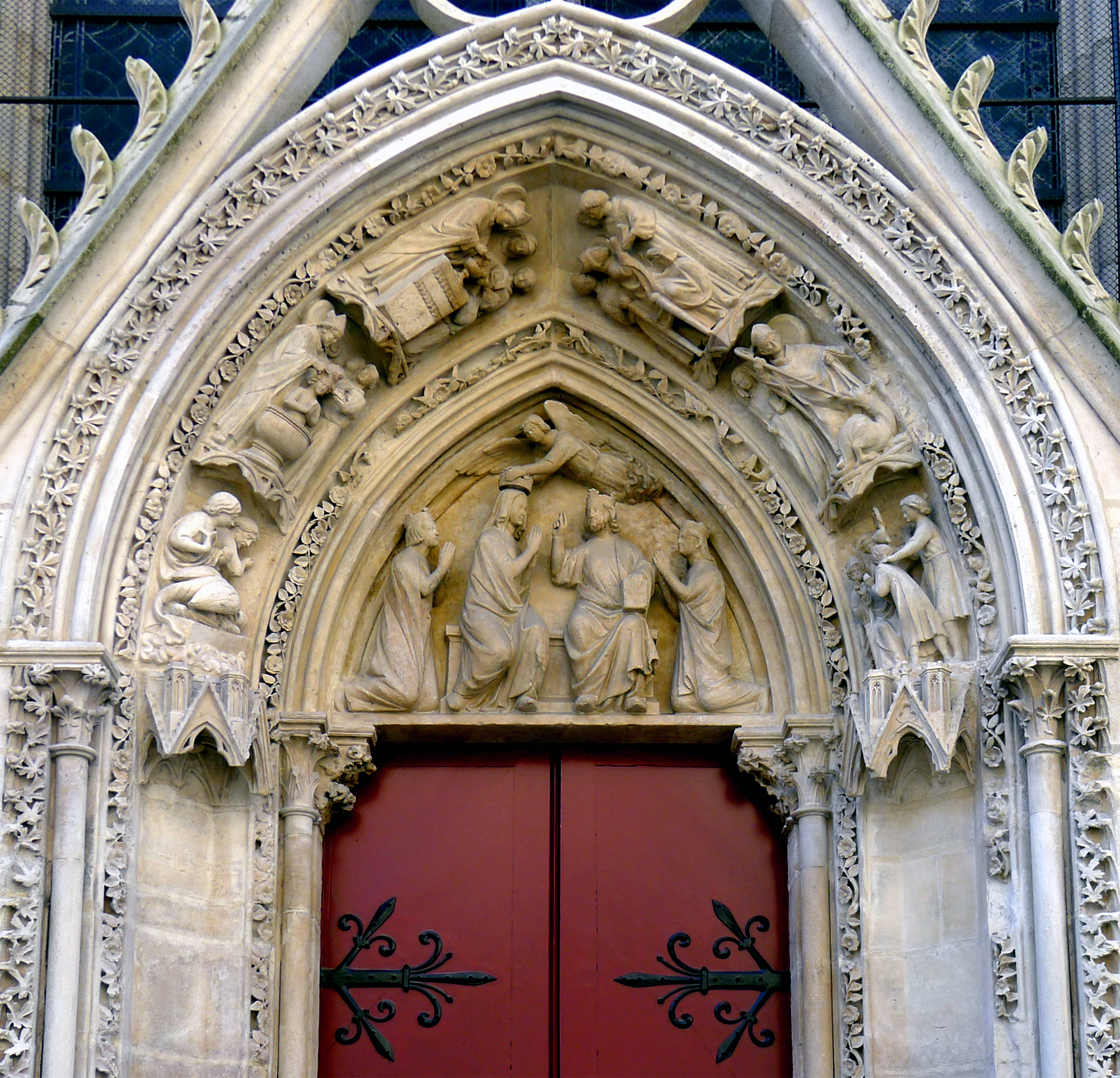 Image décorative : Notre-Dame de Paris, façade nord (tympan de la porte rouge) © Wikipédia