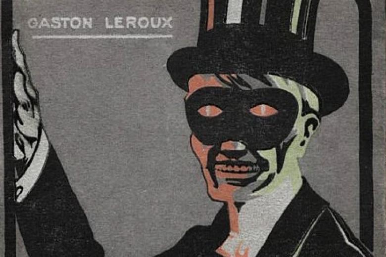 Image décorative : "Le Fantôme de l’Opéra", couverture de l'édition originale, illustration par Adolphe Cossard (éditions Pierre Lafitte et Cie, 1910)